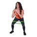 Female athlete performing a squat with green resistance bands for strength training.