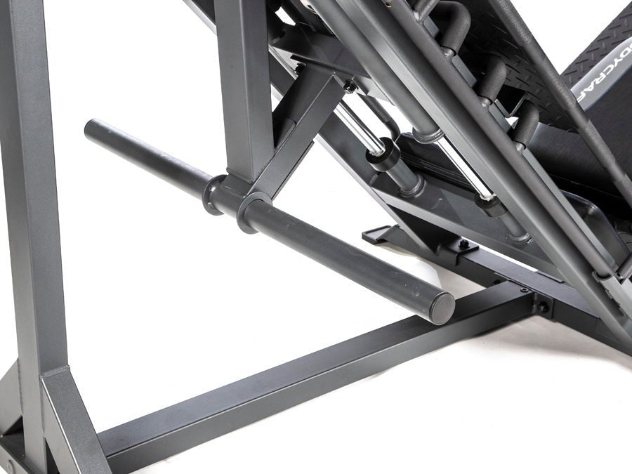 Close-up view of the empty weight plate horn on the BodyCraft F760 Leg Press and Hack Squat machine.