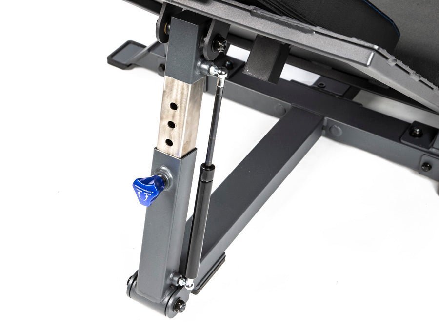 Close-up view of the gas-assisted foot plate adjustment mechanism on the BodyCraft F760 Leg Press and Hack Squat machine, highlighting the easy-to-use adjustment lever and durable construction for safe and smooth adjustments during workouts.