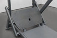 Close-up of the adjustable foot plate area on the BodyKore Pendulum Squat CF8137, featuring rubber padding for secure and targeted lower body exercises