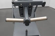 "Close-up of the dual loading pegs on the BodyKore Pendulum Squat CF8137, capable of holding up to five 45lb plates on each side for intense strength training"