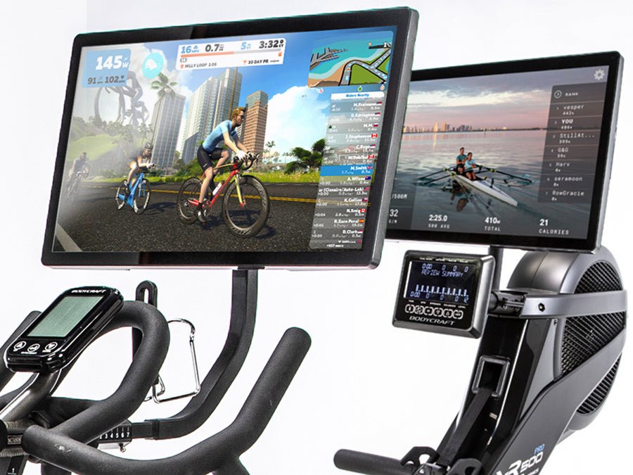 Close-up view of the Connect-22 tablet mounted on a BodyCraft rower machine and exercise bike, displaying fitness app options.