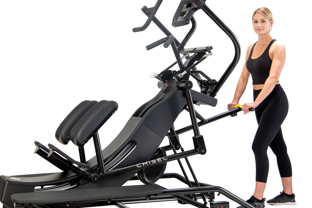 Female athlete demonstrating how to adjust the settings on the Chisel Challenger, emphasizing the machine's easy-to-use controls and customizable workout options, suitable for all fitness levels.