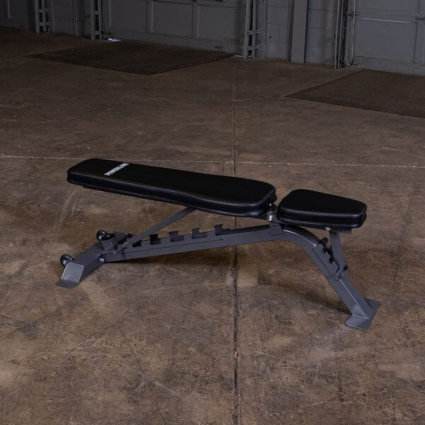 Flat bench positioned in a warehouse setting, showcasing its sturdy construction and flat alignment.