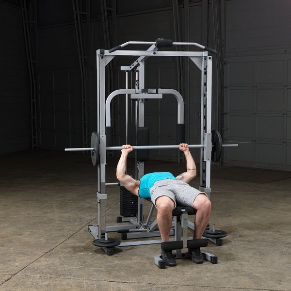 Powerline Smith Machine Package showing male athlete about to perform flat bench press