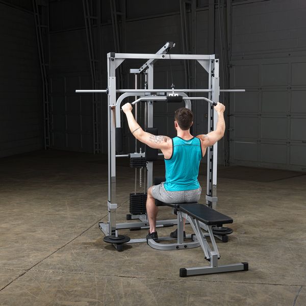 Powerline Smith Machine Package showing male athlete about to perform lat pulldown