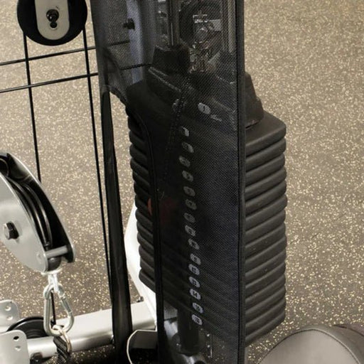 Close-up view of the weight stack on the Powerline by Body-Solid P2X Multi-Functional Home Gym, showing the advanced alloy weight plates and selector pin for easy adjustment.