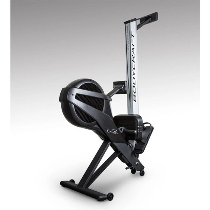 BodyCraft VR400 Pro Rower Machine folded up for storage, demonstrating its compact and space-saving design, ideal for easy storage in both home and commercial settings.