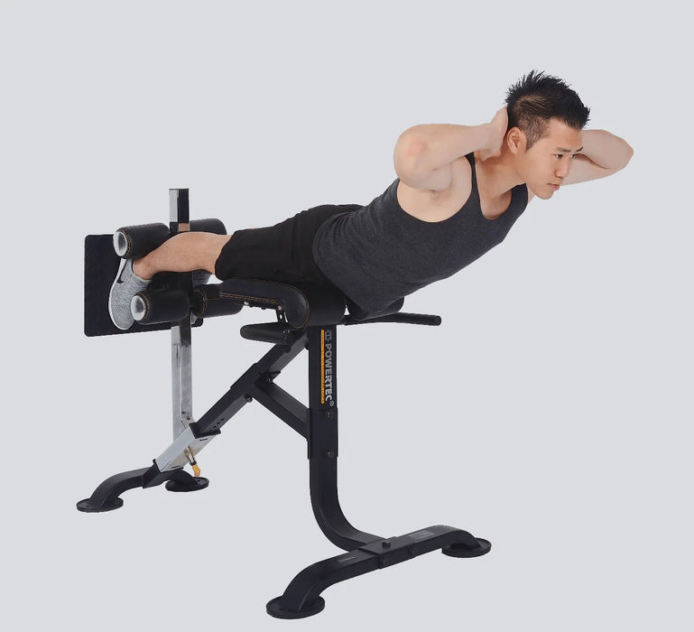 Athlete using Powertec Dual Hyperextension-Crunch P-HC20 as a horizontal hyperextension bench.